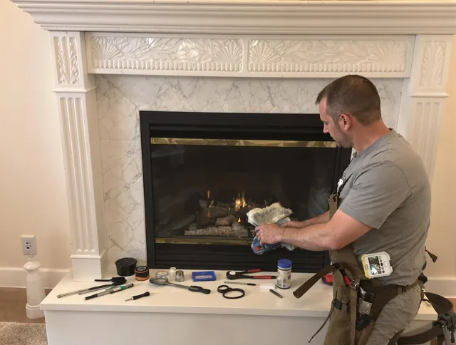 Coral Springs Chimney Sweep performing fireplace maintenance in Coral Springs, FL